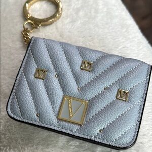 Victoria's Secret light Blue and Gold Quilted Key Card Holder. New. Never used.